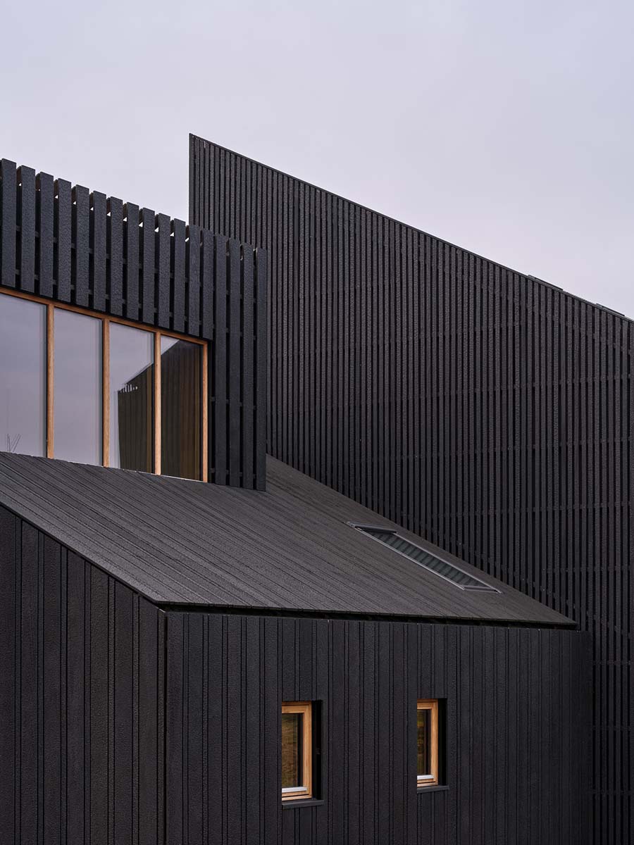 Exterior view of Tversted house in Denmark featuring charred Accoya timber cladding by EK Wood for a weather-resistant facade.